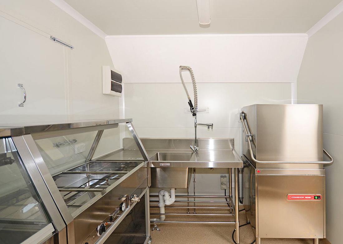 stainless appliances in a mobile kitchen built and manufactured by King Caravans Maryborough Queensland